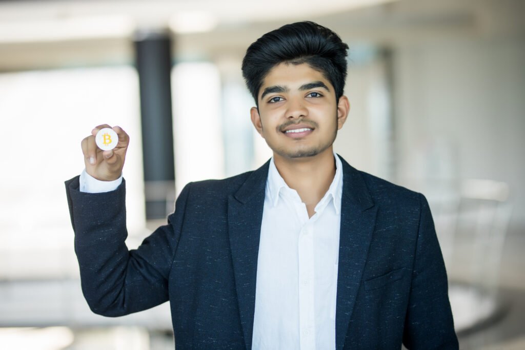 smiling young male golden bitcoin